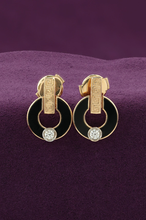 Серьги из золота c бриллиантами и ониксом