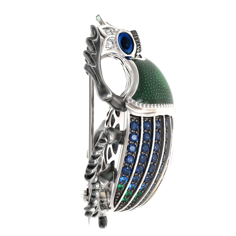 Брошь из белого золота c эмалью, фианитом и сапфиром
