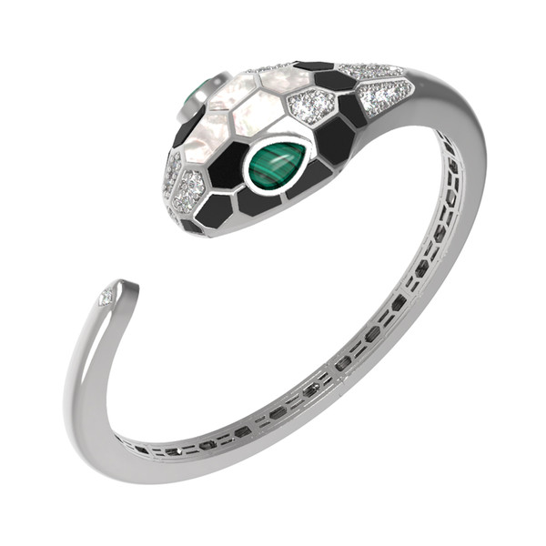 Браслет из белого золота c бриллиантами, рубином, ониксом, малахитом и перламутром